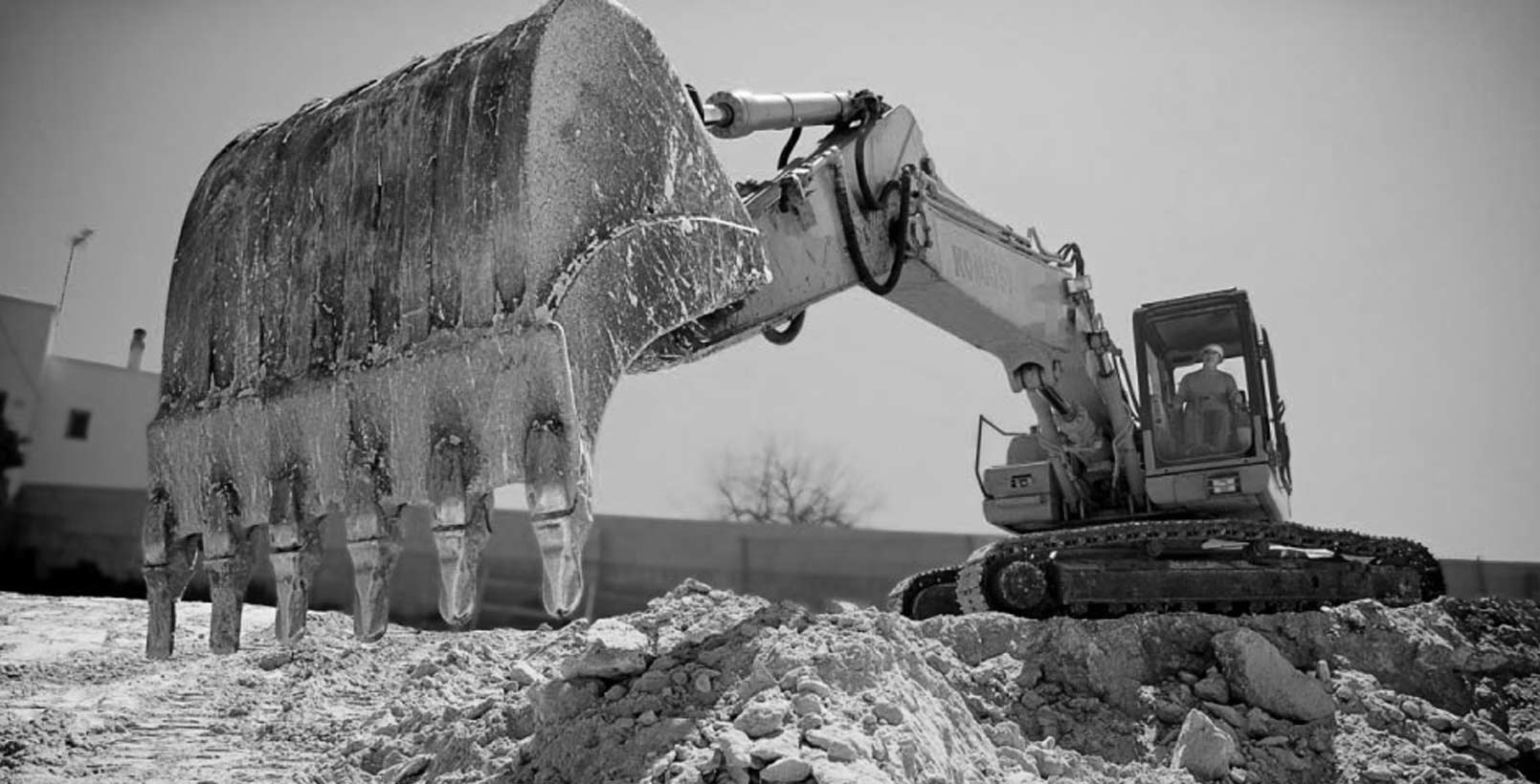 Front Loader moving land in excavation project